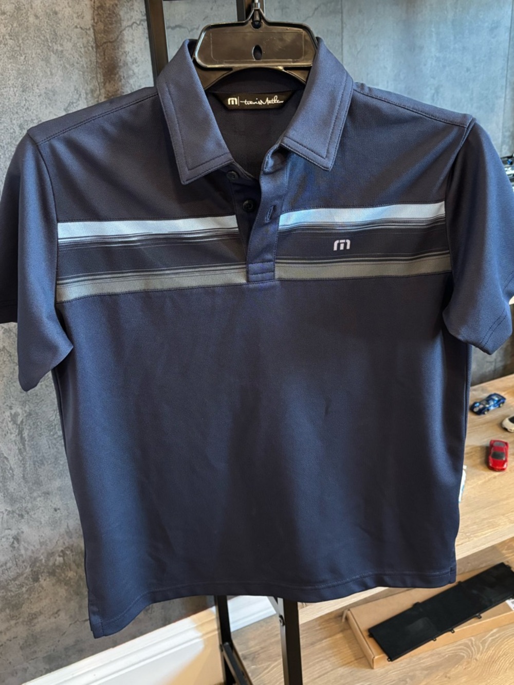 Travis Mathew Navy Short-Sleeve Polo with Light Stripe Accents